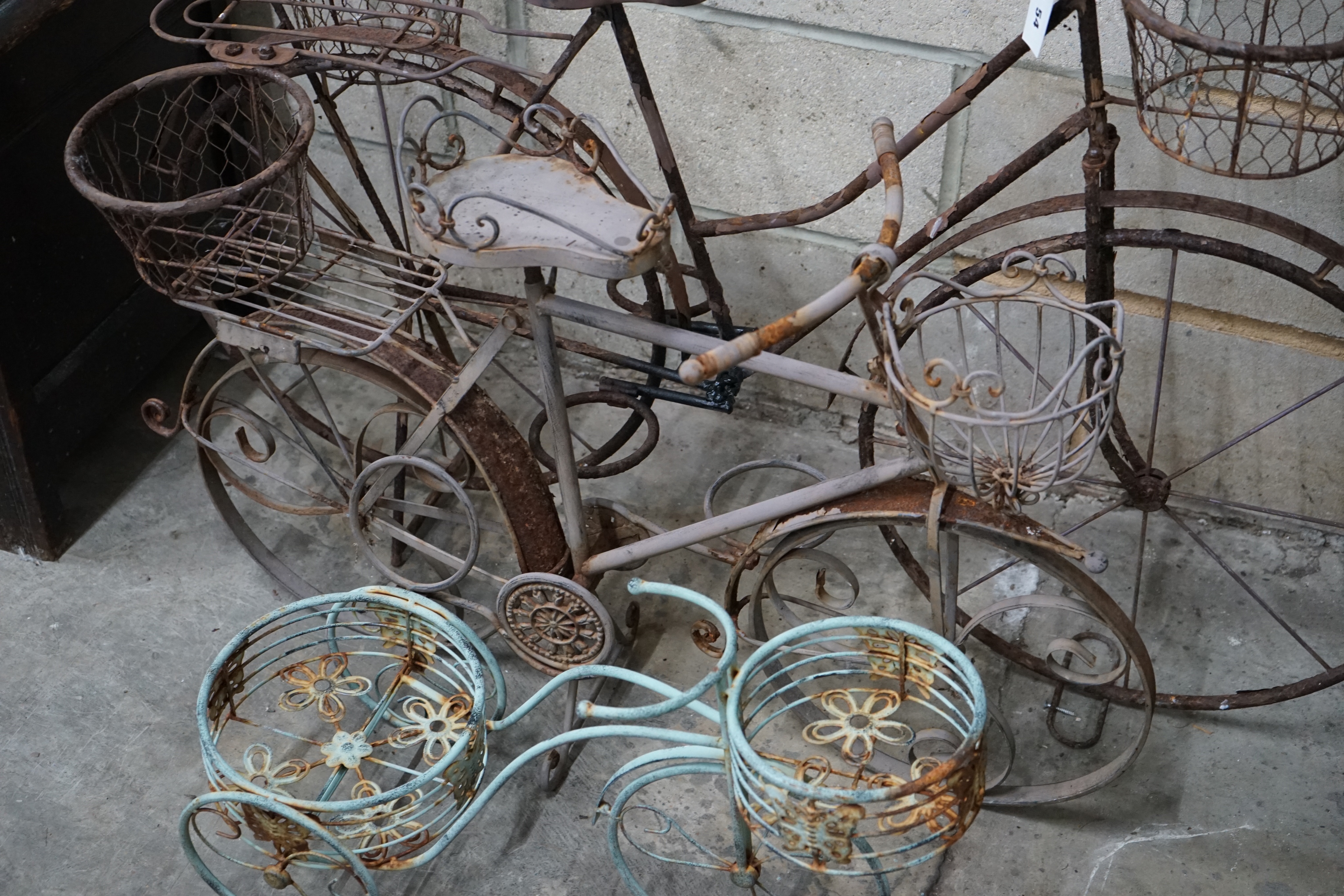 Three wirework bicycle garden planters, longest 120cm